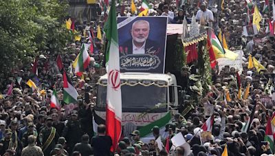 Calls for revenge echo at Haniyeh’s funeral; Tehran vows ‘punishment’