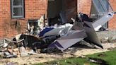 Pilot bailed out moments before plane crashed into flats