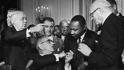 On this day in history, July 2, 1964, President Johnson signs 'sweeping' Civil Rights Act