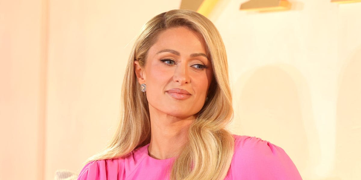 Paris Hilton says she wore a prosthetic baby bump while a surrogate carried her child