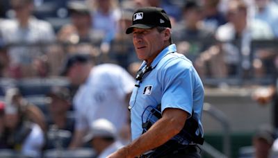 MLB umpire Ángel Hernández, a target of scorn by fans and players, retires