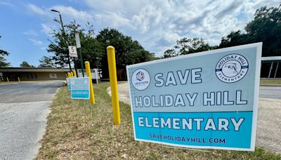 Mark Woods: Signs of the times — a neighborhood rallies to save the neighborhood school