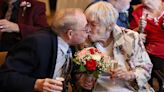 A dozen senior couples, ranging in age from 80 to 90, renew wedding vows at Elmhurst retirement community