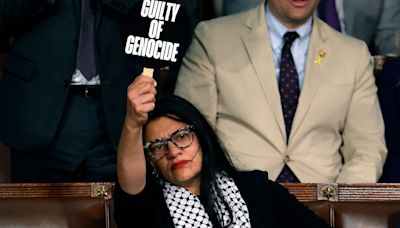 Rep. Rashida Tlaib Protests Netanyahu Speech With 'War Criminal' Sign