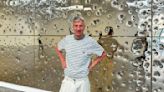 Gold and gunfire: Italian artist Cattelan's latest satirical work is a bullet-riddled golden wall