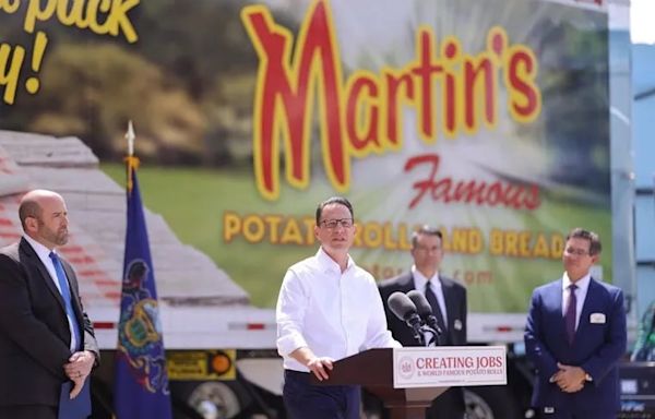 Gov. Josh Shapiro breaks bread with Martin’s Potato Rolls, one of Doug Mastriano’s top supporters