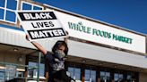 Amazon-owned Whole Foods reportedly told managers that workers couldn't wear Black Lives Matter signage at work because it was 'opening the door for union activity'