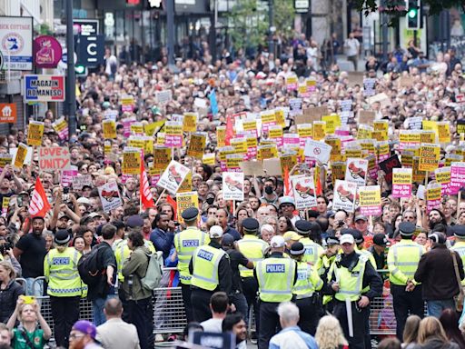 Thousands of counter-protesters rally after riots