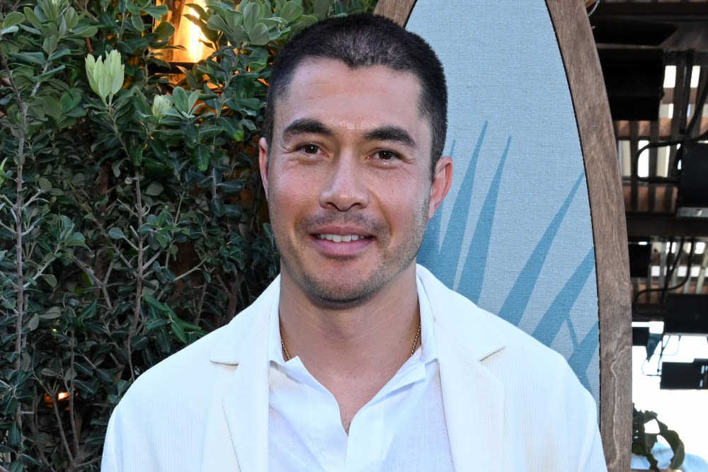 Henry Golding Says ‘A Simple Favor 2’ Is ‘Much More Bananas,’ Explains Cutting Off His Hair After ‘Nine...