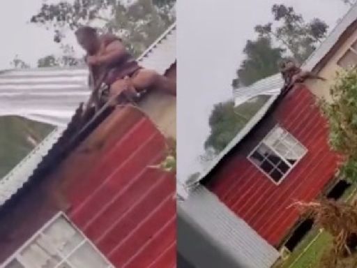 VIDEO: Mujer se aferra al techo de su casa para que huracán Beryl no se lo lleve