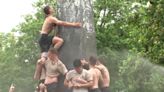 Moment US Naval Academy freshmen reach top of greasy Herndon Monument