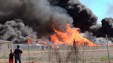 Black plume of smoke visible in Fresno as fire erupts near an elementary school