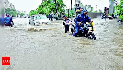 Heavy rain disrupts life in Surat city | Surat News - Times of India