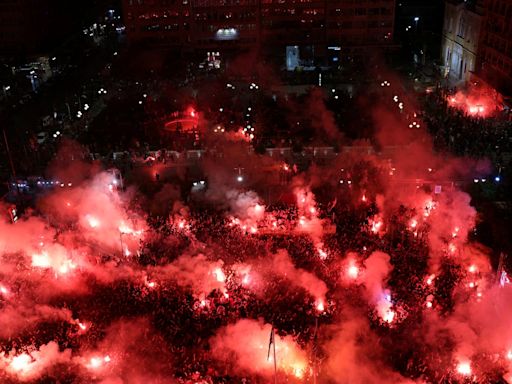 Passionate Olympiakos fans celebrate historic victory