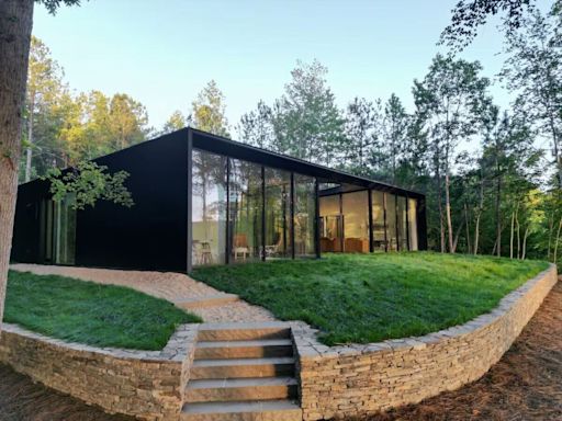 We spent $900,000 to build a glass house. Airbnb guests love it, and it's a dream to live at one with the outdoors.