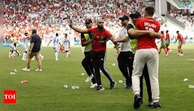 Watch: Olympic football kicks off to a violent and chaotic start as Morocco fans rush the field vs Argentina | Paris Olympics 2024 News - Times of India