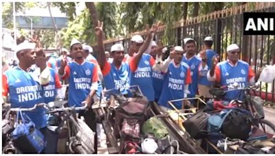 Mumbai dabbawalas sport Team India jerseys ahead of Men's T20 cricket World Cup. Watch