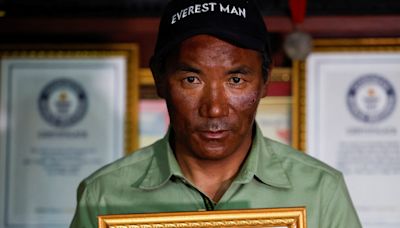 Nepal sherpa scales Everest for record 30th time; two climbers go missing