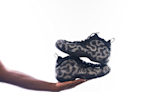 A detailed look at the Comme des Garçons × Nike Air Foamposite One “Olympic” pair