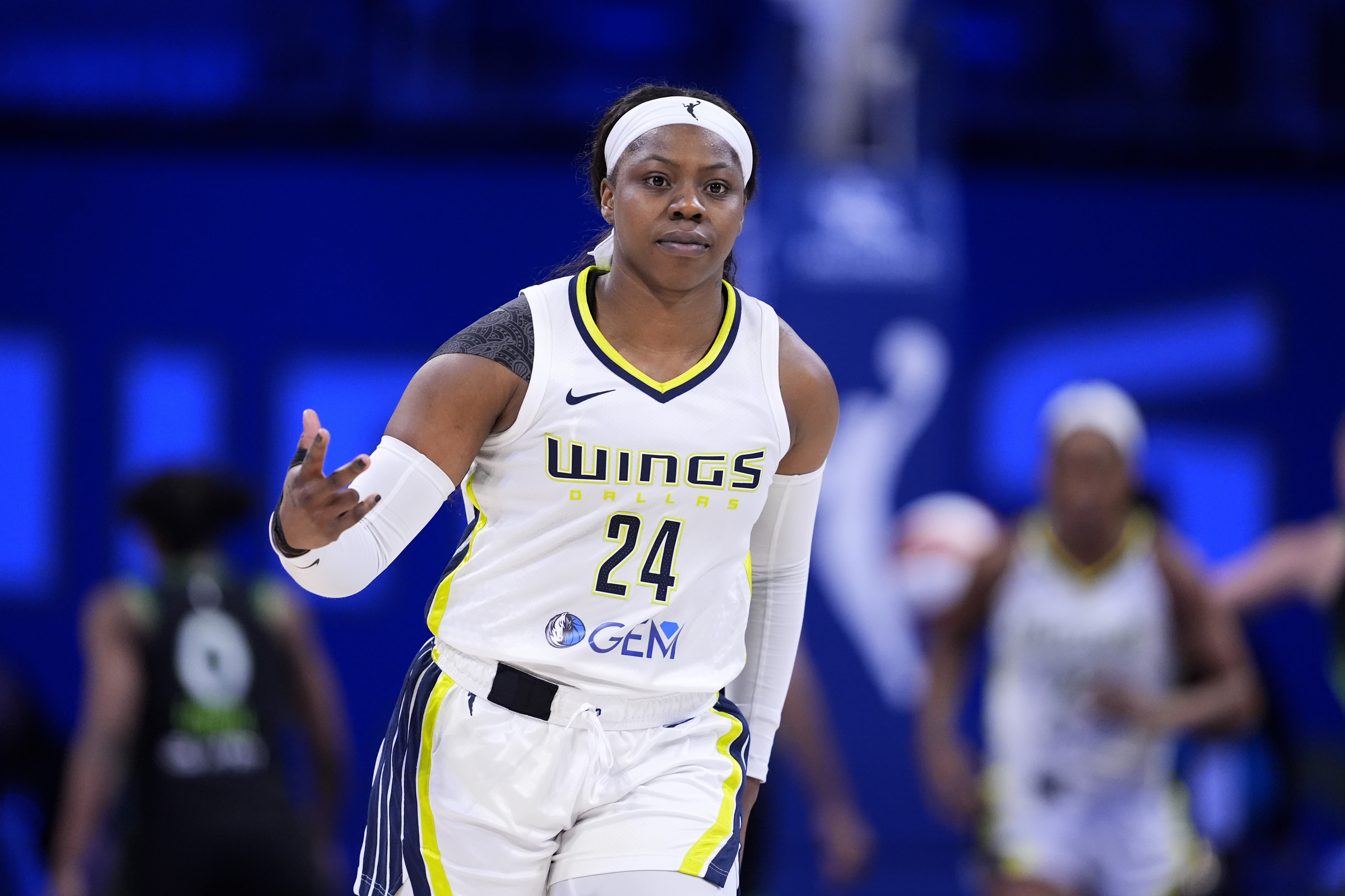 DiJonai Carrington scores 10 of her 22 in overtime and the Sun beat the Mystics 94-91