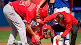 Taylor Ward carted off after taking a pitch to face in Angels' loss to Blue Jays