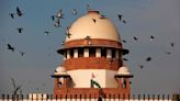 India’s top court upholds Kashmir’s loss of special status in ruling hailed by Modi