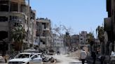 Members of global chemical weapons watchdog vote to keep Syria from getting poison gas materials
