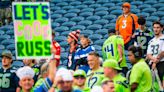 Russell Wilson hugs Tyler Lockett, other Seahawks, Seattle fans loudly boo 3 before opener