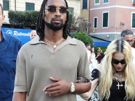 Madonna, 65, holds hands with new boyfriend Akeem Morris, 28