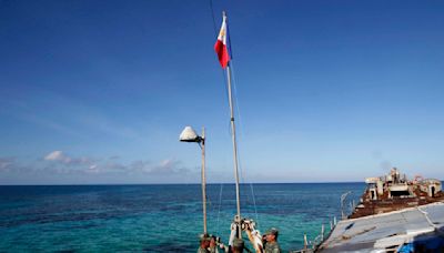 Philippines says China coast guard seized food dropped by plane for Filipino forces in disputed sea