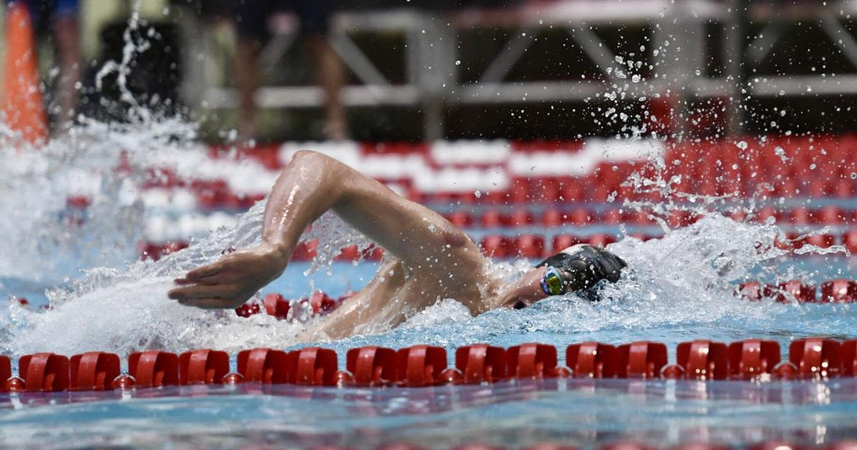 Cheyenne Mountain’s Barrett Kerrigan shatters 500 prelim time for gold as Hawks place third