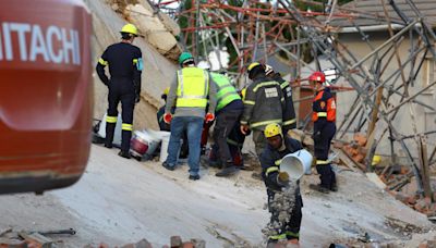 Building collapse in South Africa sparks complex rescue operation with dozens of workers missing