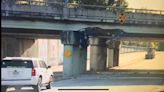 Truck collides into overpass in Raleigh