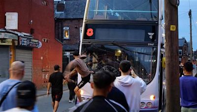 UK: Police car flipped over, bus set on fire in Leeds as riot breaks out