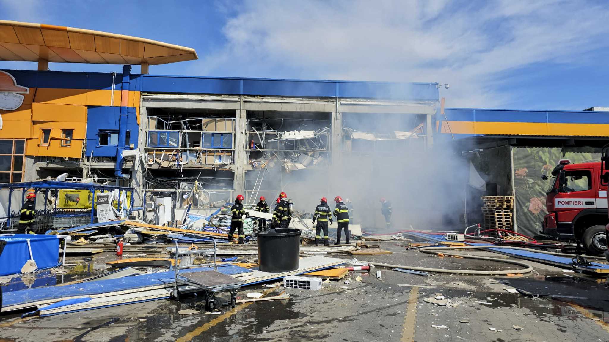 An explosion at a DIY chain store in Romania injures at least 13 people, 4 seriously