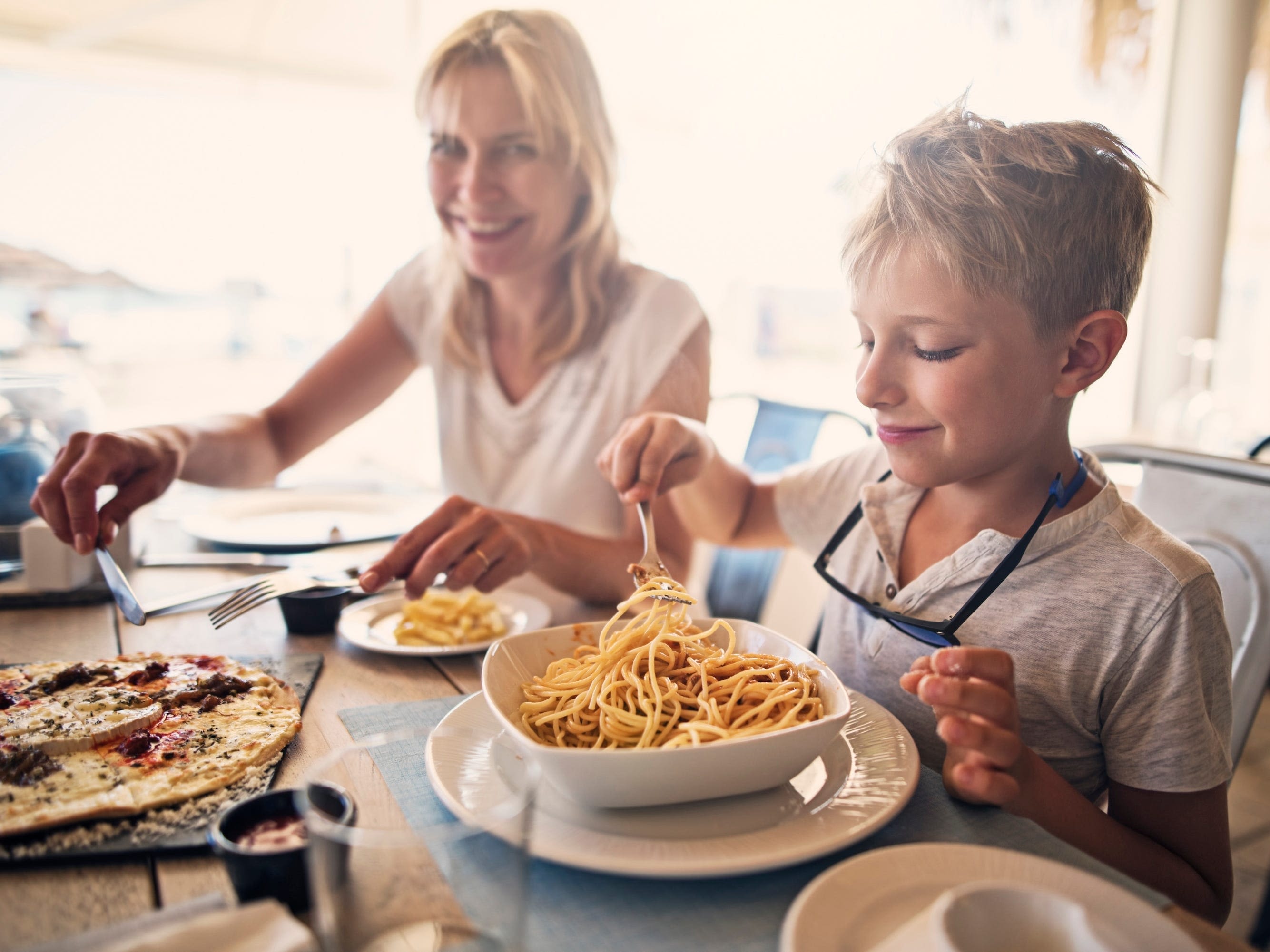 I'm an American mom living in the UK. When my kids visited the US they were shocked at how 'big the food' is and how every drink is mostly ice.