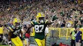 Best photos of Romeo Doubs’ acrobatic touchdown catch and Lambeau Leap