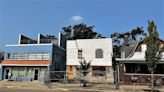 What's happening with the collapsing building on Walnut Street in Bloomington?