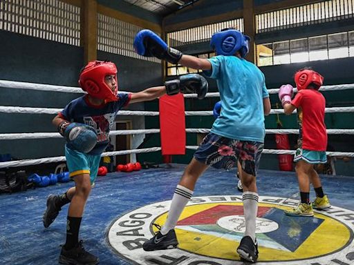 Bare-bones gym breeds Olympians in Philippines boxing capital Bago