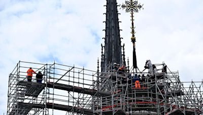 Cross restored to Notre Dame cathedral more than 5 years after fire