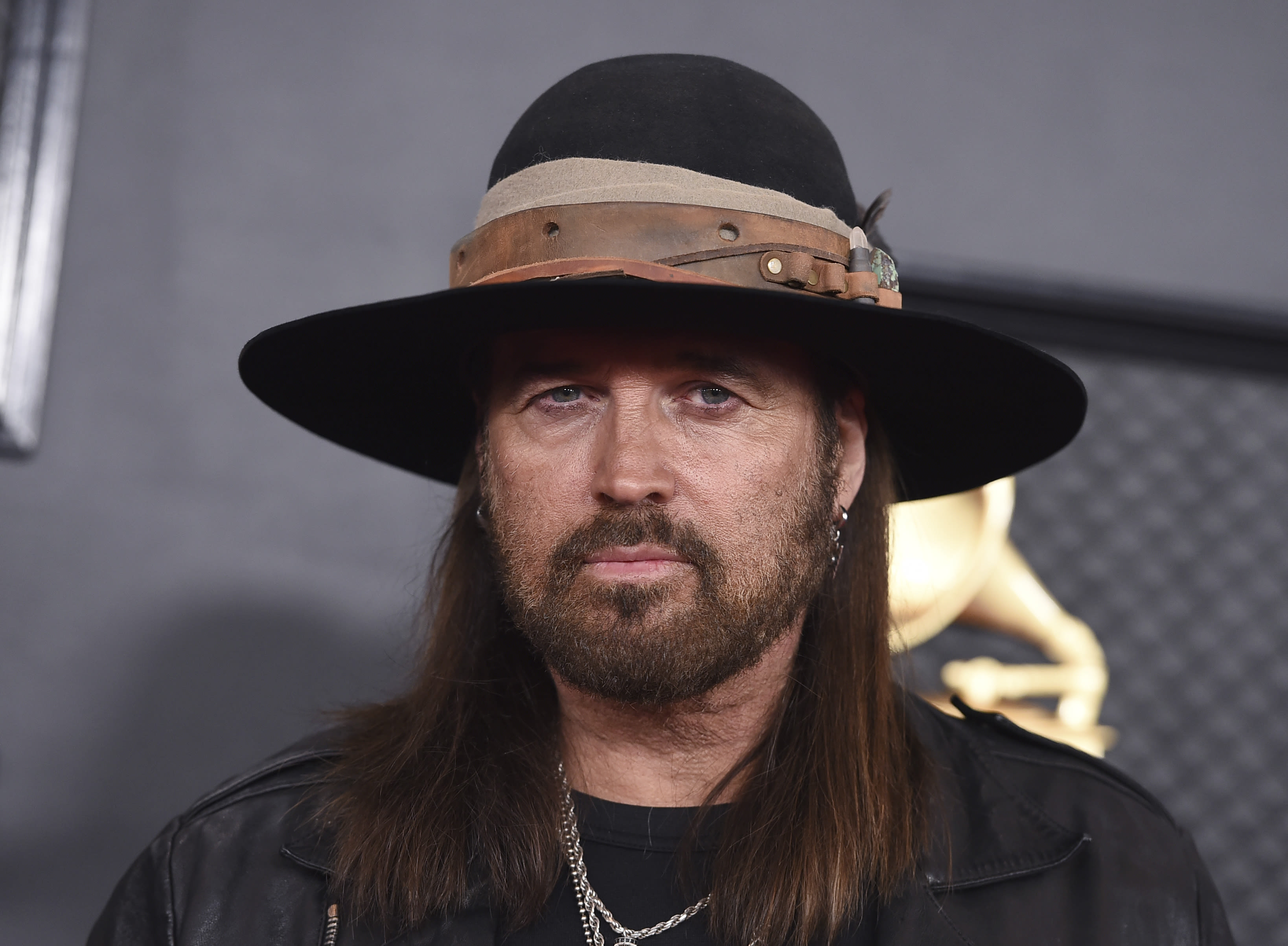 Billy Ray Cyrus finalizes divorce from singer Firerose 3 months after filing