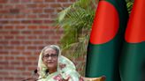 Bangladesh Prime Minister Sheikh Hasina blames opposition for violence, curfew to remain