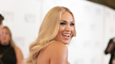 Carrie Underwood Shows Off Sculpted Legs In Shimmering Gown — See The Stunning Red Carpet Photos | iHeartCountry Radio