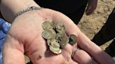 'Jackpot' of 2,000 early-medieval coins discovered by hiker in Czech Republic