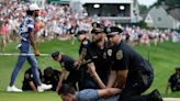 Final round at Travelers Championship disrupted by climate protesters on 18th green