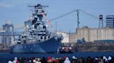 USS New Jersey departs Camden waterfront for Philadelphia for repairs