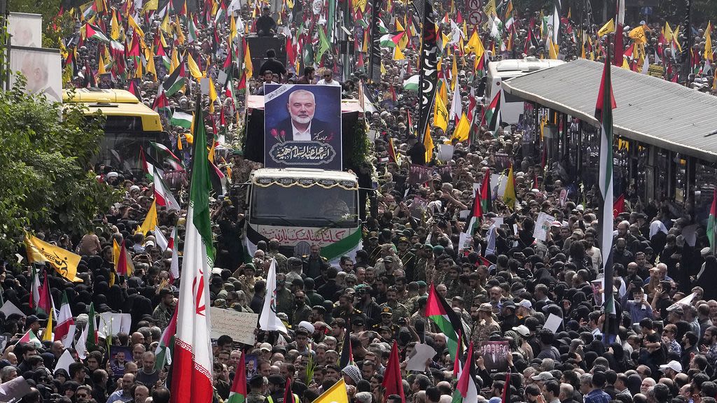 Iran's supreme leader prays over coffin of Hamas leader Haniyeh