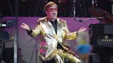 Sir Elton John putting piano, jumpsuit and platform boots up for auction