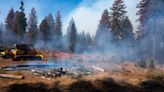 California firefighters make progress as wildfires push devastation and spread smoke across US West