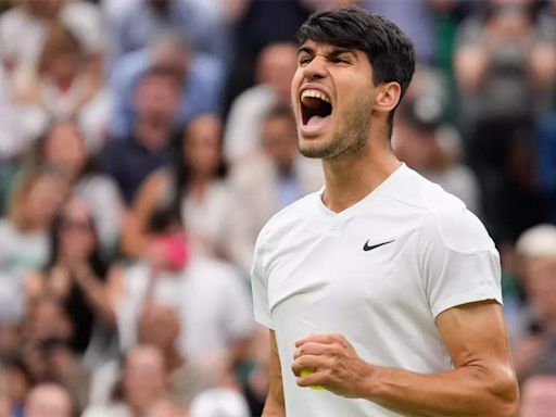 Carlos Alcaraz overcomes slump to reach Wimbledon quarter-finals | Tennis News - Times of India